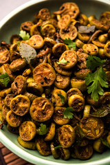 Tendli / Kundroo sabzi or Kovakkai Poriyal also known as ivy gourd, served in a bowl or karahi. selective focus