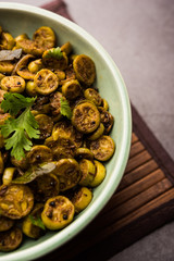 Tendli / Kundroo sabzi or Kovakkai Poriyal also known as ivy gourd, served in a bowl or karahi. selective focus