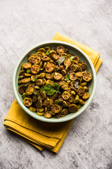 Tendli / Kundroo sabzi or Kovakkai Poriyal also known as ivy gourd, served in a bowl or karahi. selective focus