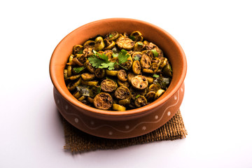 Tendli / Kundroo sabzi or Kovakkai Poriyal also known as ivy gourd, served in a bowl or karahi. selective focus