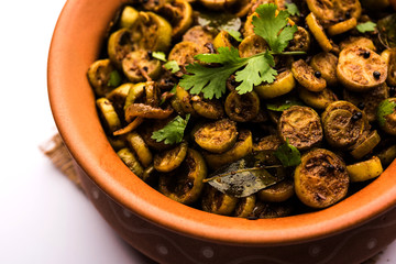 Tendli / Kundroo sabzi or Kovakkai Poriyal also known as ivy gourd, served in a bowl or karahi. selective focus