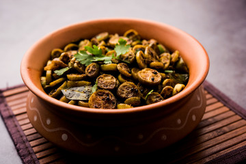 Tendli / Kundroo sabzi or Kovakkai Poriyal also known as ivy gourd, served in a bowl or karahi. selective focus