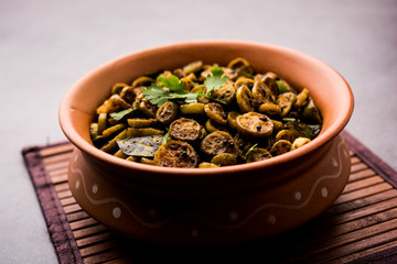 Tendli / Kundroo sabzi or Kovakkai Poriyal also known as ivy gourd, served in a bowl or karahi. selective focus