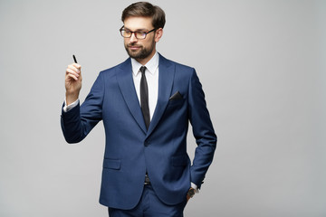 businessman writing or drawingon a virtual screen