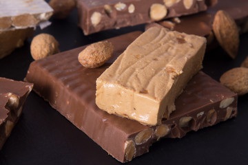 Almond nougat, typical Christmas dessert on  background