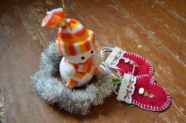snowman on a wooden floor