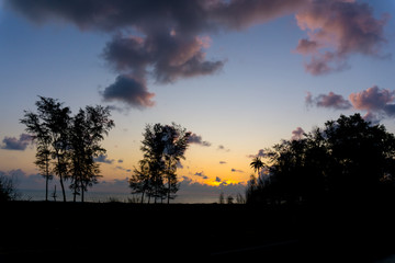 Fototapeta premium Panorama of sunset at beach with blue and orange color background,soft focus