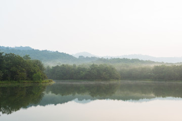 Obraz na płótnie Canvas Beautiful nature and fog on the reservoir at Jedkod-Pongkonsao Natural Study in Saraburi Thailand 