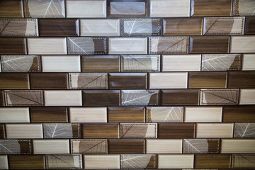 Background of brown and white rectangular tiles. Backgrounds, textures, design, construction.