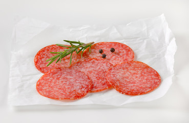 Thinly sliced salami sausage