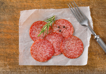 Thinly sliced salami sausage