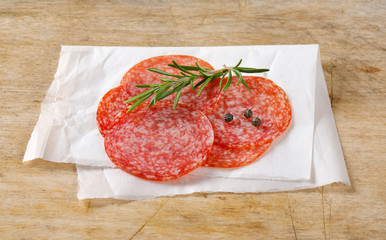 Thinly sliced salami sausage