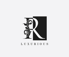 R Letter Logo. Black and White R With Classy Leaves Shape design perfect for fashion, Jewelry, Beauty Salon, Cosmetics, Spa, Hotel and Restaurant Logo.