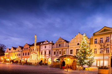 Christmas time on Masaryk square at night. Center of a old town of Trebon, Czech Republic.