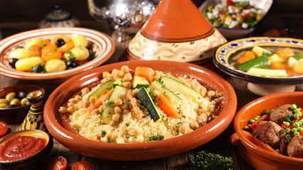 assorted of traditional moroccan tajine with dried fruits and spices - obrazy, fototapety, plakaty