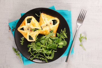 puff pastry with spinach and salad