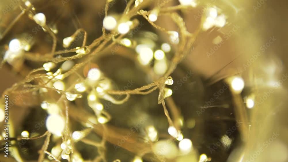 Poster glowing lights with beautiful bokeh and blurred sparkle in golden color