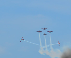Turboprop light-engine aircrafts flying in the air.