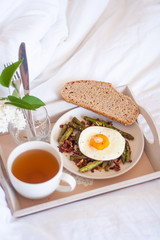 Breakfast in bed - roasted asparagus and sunny side egg
