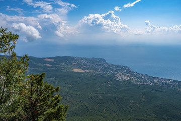 Scenic view from Ai-Petri mountain to the village of Miskhor and the Black Sea.