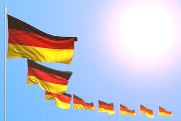 nice anthem day flag 3d illustration. - many Germany flags placed diagonal with bokeh and free place for content