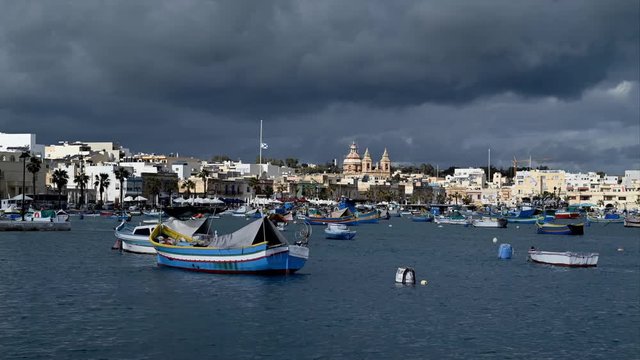 Malta boats in harbor of Marsaxlokk