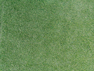 Close up green artificial turf abstract background.Green grass turf texture background.