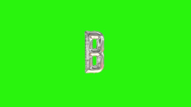 Silver letter B. Silver foil helium balloon alphabet floating on green screen