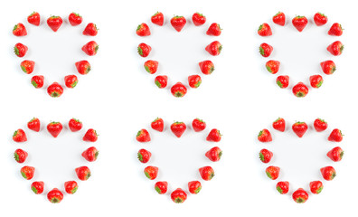 Strawberry on white background, top view. Berries pattern. Hearts frame made of fresh strawberry on white background. Valentines day, creative food concept