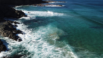 Dawn watching the waves of the sea in the Atlantic Ocean