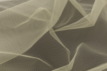 Beautiful close up of  white tulle fabric with textile texture background