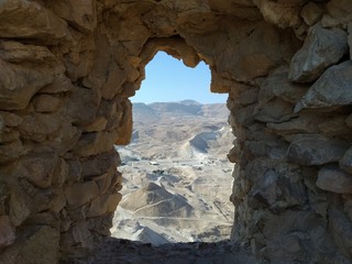 Masada National Park, Israel December 23th 2019 - stone arch to the platform with a view of the dead sea and the mountains of Jordan. View from the fortress Massada in Israel