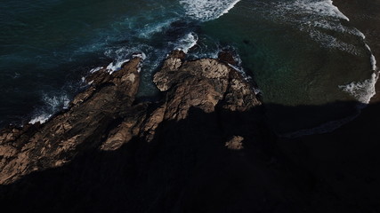 Dawn watching the waves of the sea in the Atlantic Ocean