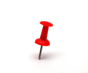 red pin on a white background, macro, isolate