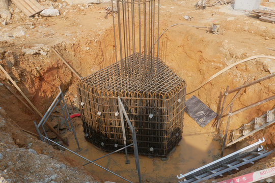 Pile cap and column stump under construction at the construction site. Constructed using reinforced concrete with plywood timber as a form work.