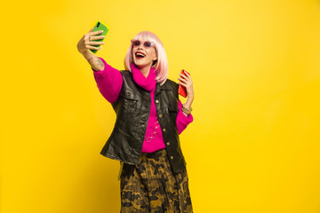 It's hard to be influencer. Selfie only in special clothes and make up. Caucasian woman's portrait...