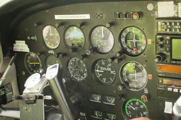 Analog swithes and dials on an airplane