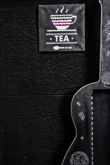 Fototapeta premium Guitar and Black Background