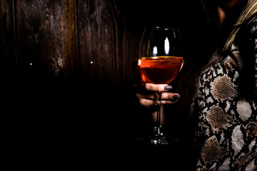 aperol spritz and woman's hand