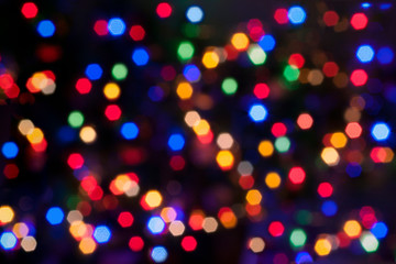Beautiful bright abstract background - colorful bokeh. Texture for holiday, new year, christmas