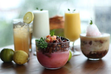 Es Campur. Traditional Indonesia drinks. Traditional Indonesia dessert consist of Tape, grass jelly, kidney beans, dawet. Selective Focus