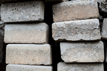 Old cracked pavement rocks stacked