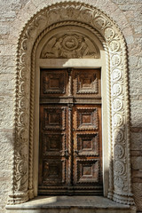 Carved wooden door in the town of Kotor in Montenegro