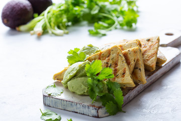 Grilled herbed tofu with avocado cream,  vegan meal, plant based diet