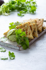 Grilled herbed tofu with avocado cream,  vegan meal, plant based diet