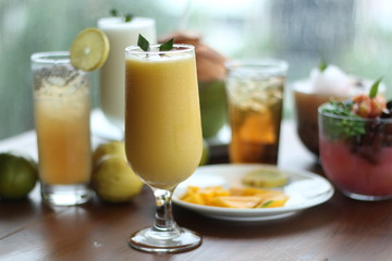 Delicious Juice Mango. A sweet dessert contains mango, blend ice. Front View