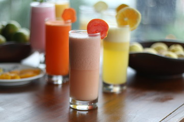 Fresh Juice Tomato in a glass. Front view