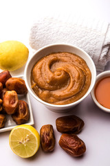 Dates Face mask for supple, smooth and clear skin with ingradients like fresh raw khajoor, lemon and honey. selective focus