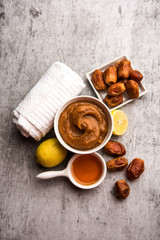 Dates Face mask for supple, smooth and clear skin with ingradients like fresh raw khajoor, lemon and honey. selective focus