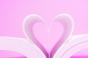 Pink Heart Shape- Create from book on Pink Background - Valentine Day - Love Concept 